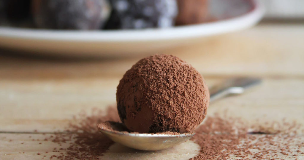 Chocolate truffles with cocoa, nuts and coconut