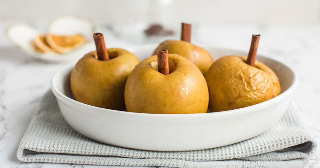 baked apple with cinnamon stick